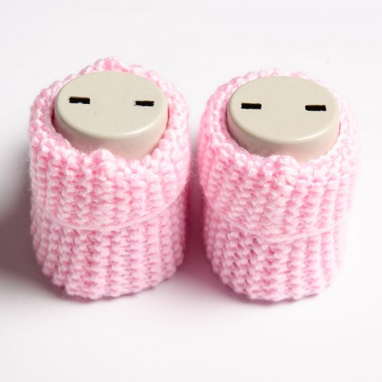 Botoși tricotați roz pentru bebeluși
